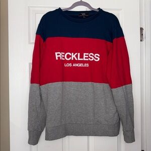 Young and Reckless sweater